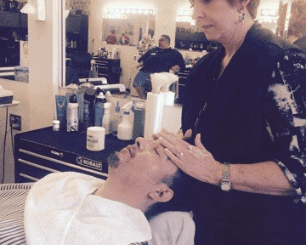 Barber College — Barber Massaging Man's Head in Tucson, AZ